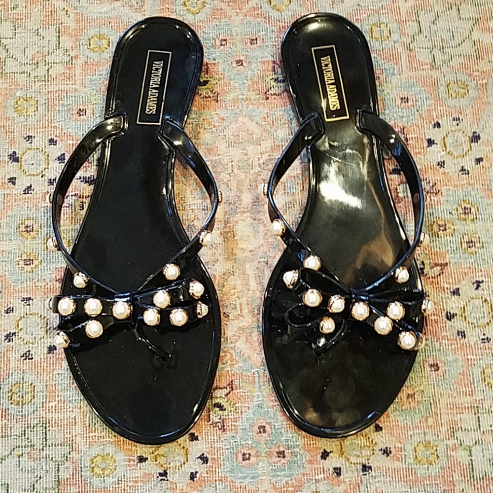 Black bow flip flops